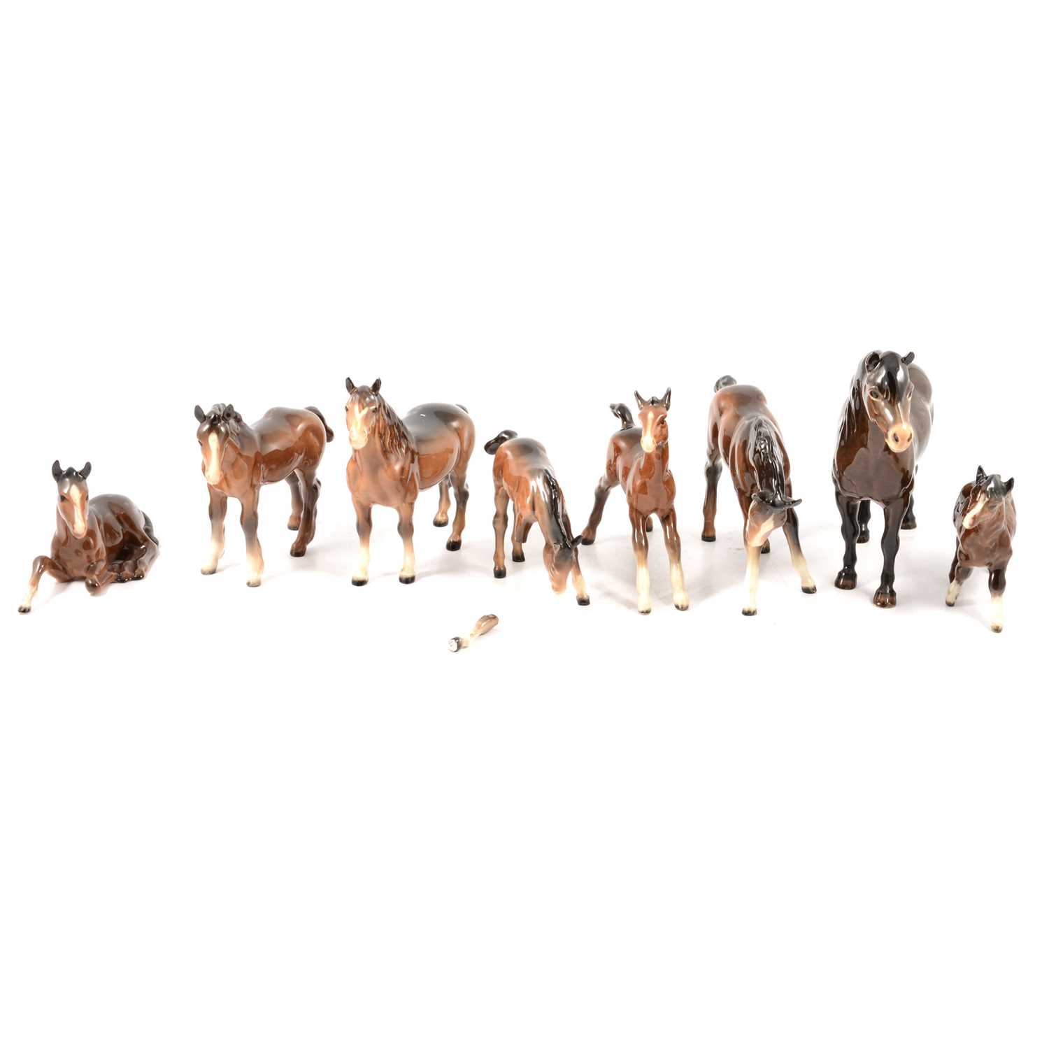 Lot 114 - Eight Beswick models of brown horses and foals.