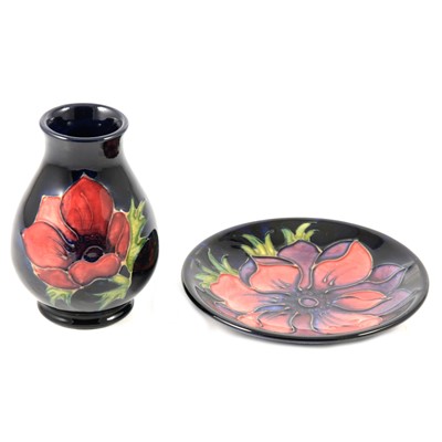 Lot 47 - Moorcroft Pottery - an Anemone pattern vase and small dish.