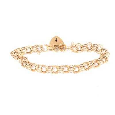 Lot 366 - A 9 carat yellow gold solid double curb link bracelet.