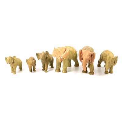 Lot 57 - Pair of Sitzendorf porcelain figures, and set of six Royal Dux style elephants.