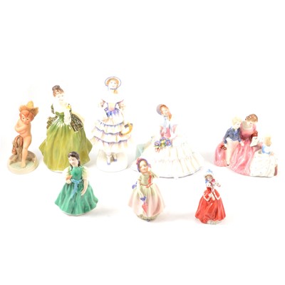 Lot 17 - Collection of seven Doulton figurines, together with a Goebel figurine