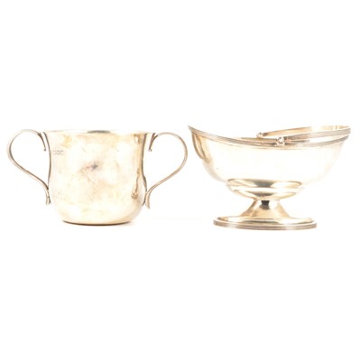 Lot 321 - Silver Regency style sweet basket, maker's mark rubbed, Birmingham 1908, and another.