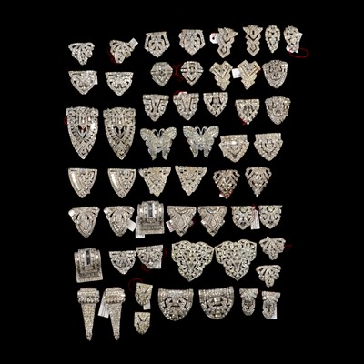 Lot 401 - Twenty-seven pairs of Art Deco and later paste set dress clips.