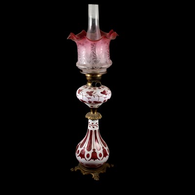 Lot 141 - Victorian opaque overlaid ruby glass oil lamp