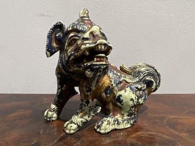 Lot 113 - Two Chinese teapots and a celadon lion