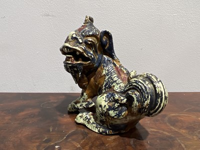 Lot 113 - Two Chinese teapots and a celadon lion