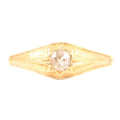 Lot 344 - A gypsy set diamond solitaire ring.