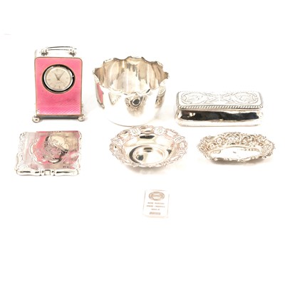 Lot 487 - A collection of small silver, pin trays, enamelled clock case, ingot, dish etc