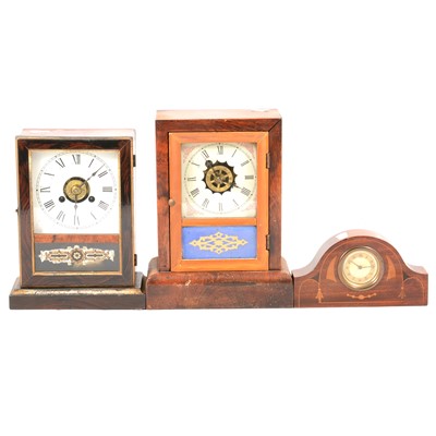 Lot 216 - American shelf clock; another American shelf clock; oak cased mantel clock, silvered chapter ring; and a small inlaid mantel clock.