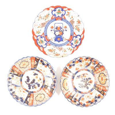 Lot 15 - Pair of Imari plates and another similar