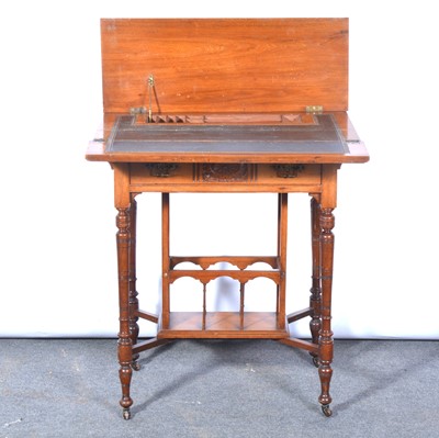 Lot 522 - Victorian walnut writing table