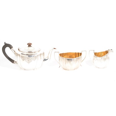 Lot 238 - Edwardian silver three piece teaset, London 1908/1910