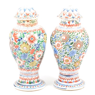 Lot 1 - Pair of Chinese porcelain covered vases, clobbered decoration