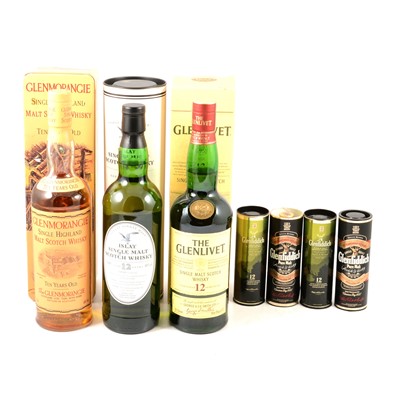 Lot 156 - Three assorted bottles of Scotch whisky and four whisky miniatures.