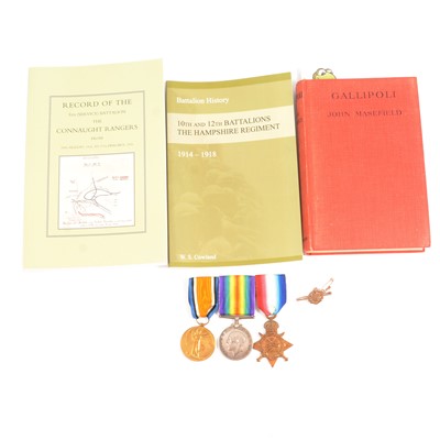 Lot 213 - Medals: A WW1 group of three to 10017 Pte H T Bulpitt Hamps. R., plus books relating to WW1.