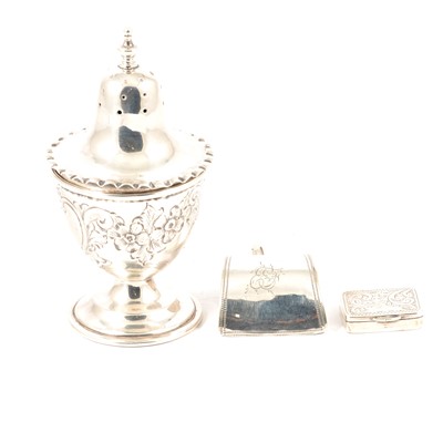 Lot 300A - A silver vinaigrette, George III caddy spoon and pepperette.