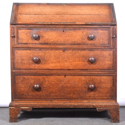 Lot 461 - George III oak and mahogany banded bureau