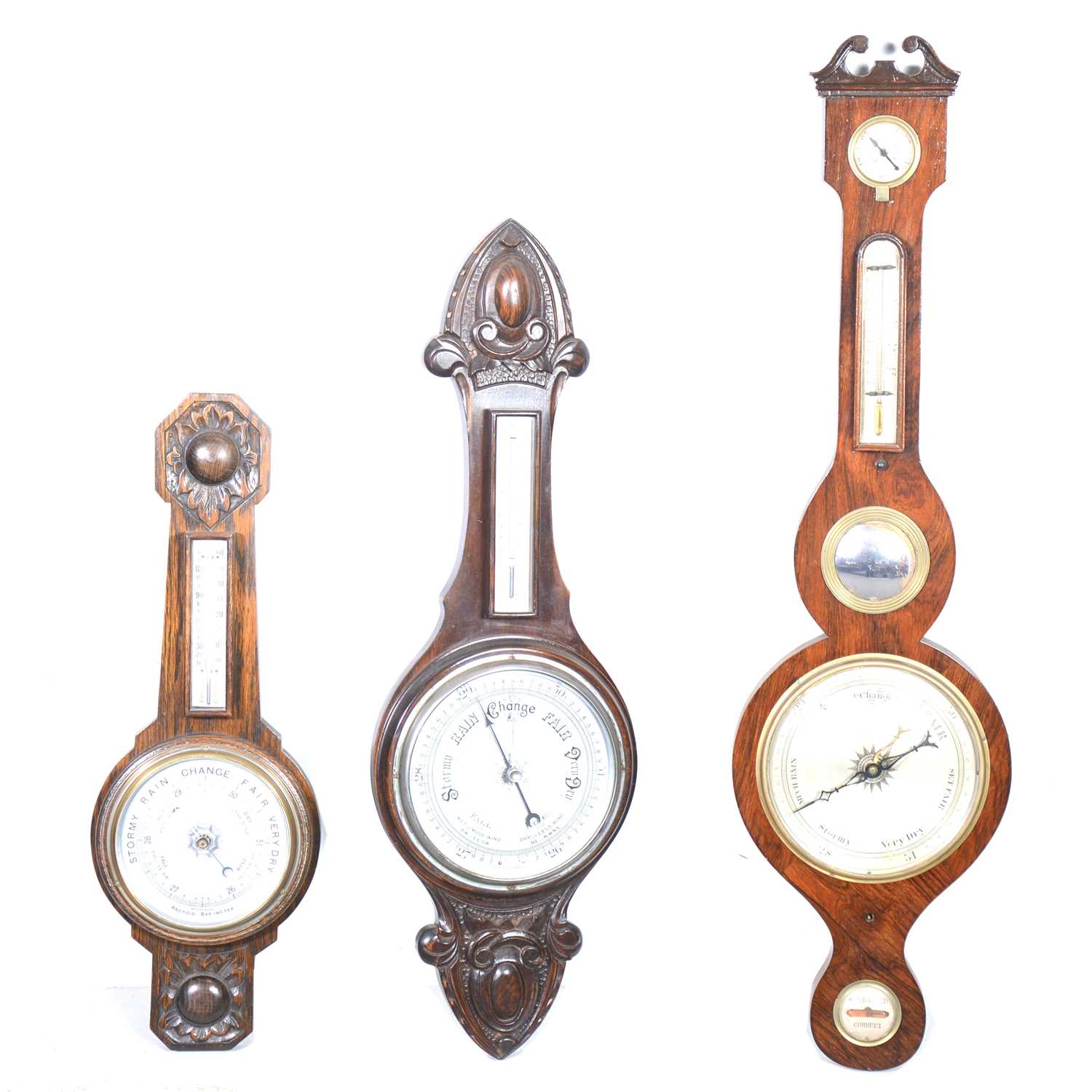 Lot 540 - Two oak cased aneroid barometers, and a