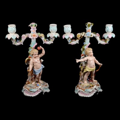 Lot 40 - Pair of Continental porcelain twin-light candelabra