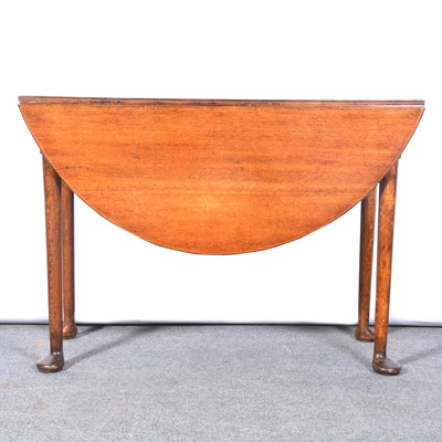 Lot 457 - George III oak dropleaf table