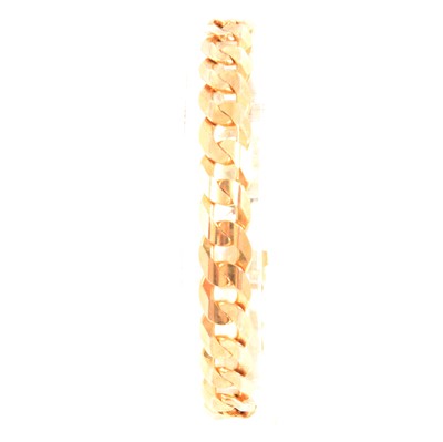 Lot 215 - A 9 carat yellow gold flat curb link bracelet.