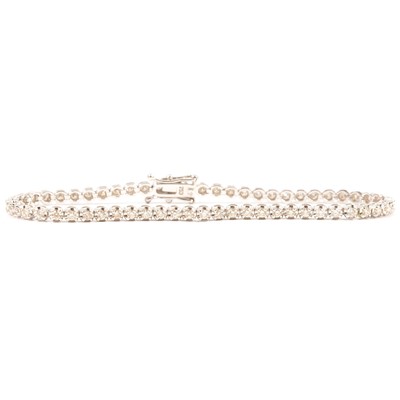 Lot 202 - A modern diamond set line bracelet by Lanes.