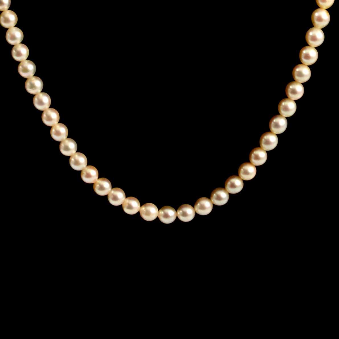 Lot 299 - A cultured pearl rope necklace with ruby