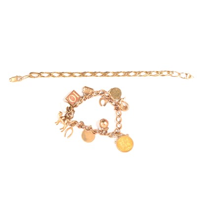 Lot 175 - A 9 carat gold charm bracelet, and a yellow metal bracelet.