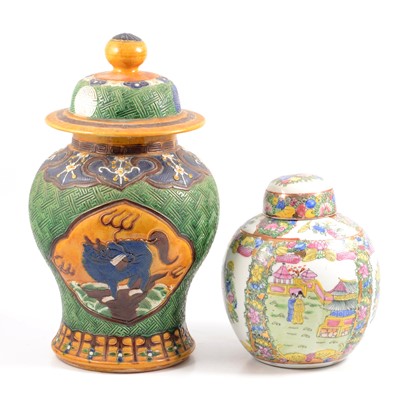 Lot 26 - Chinese earthenware vase and cover, and a modern porcelain ginger jar and cover