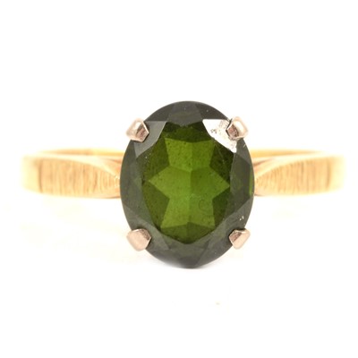 Lot 80 - A green tourmaline solitaire ring.