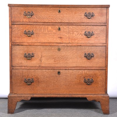 Lot 406 - George III oak chest of drawers