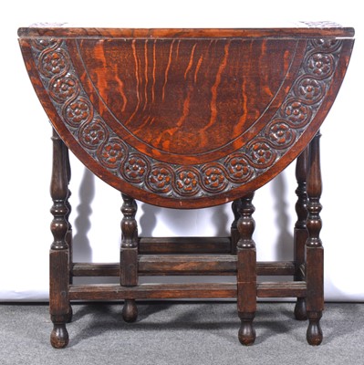 Lot 413 - Small carved oak gateleg table