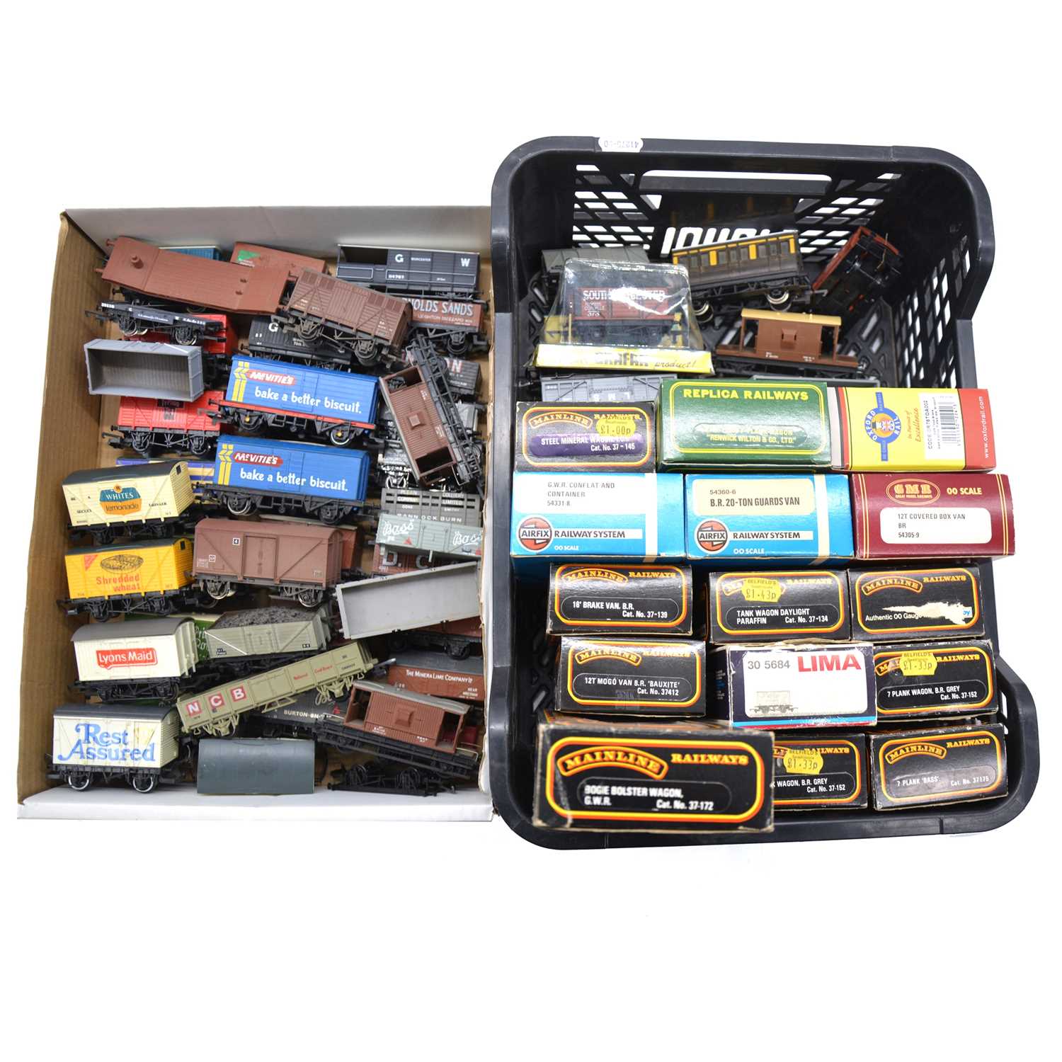 Lot 195 Two trays of OO gauge model railway rolling