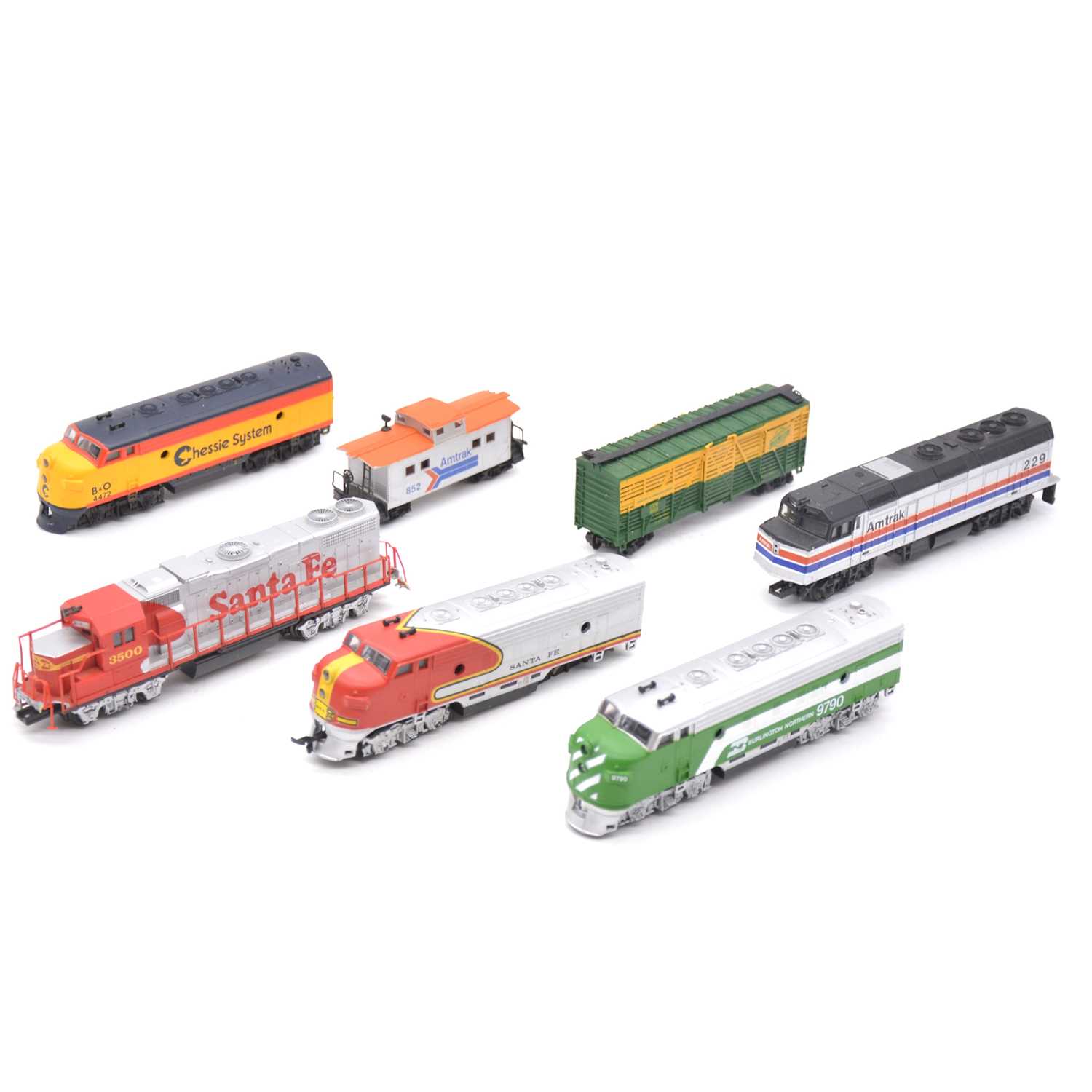 Lot 260 - Five Life-Like HO gauge model railway locomotives and two freight wagons.