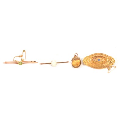 Lot 287 - Three Victorian and later brooches  and a citrine pendant.