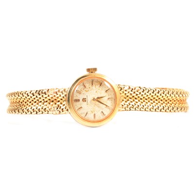 Lot 380 - Omega - a lady's 9 carat yellow gold bracelet watch.