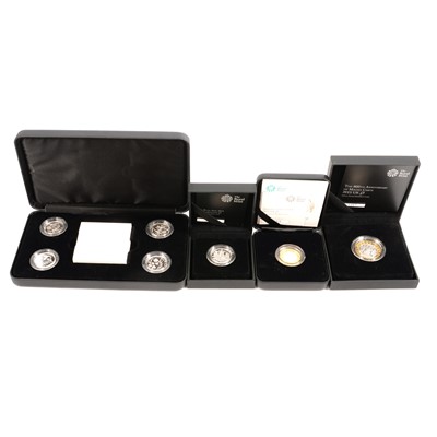 Lot 207 - Four Royal Mint commemorative coin sets