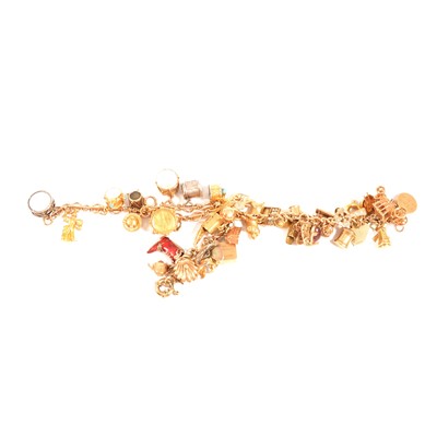 Lot 176 - Two 9 carat yellow gold charm bracelets with charms of mixed metals and standards.