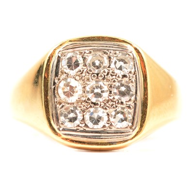 Lot 124 - A diamond nine stone ring.