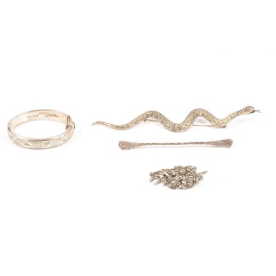 Lot 446 - A silver half hinged bangle, three brooches.