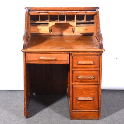 Lot 463 - Edwardian oak roll top desk