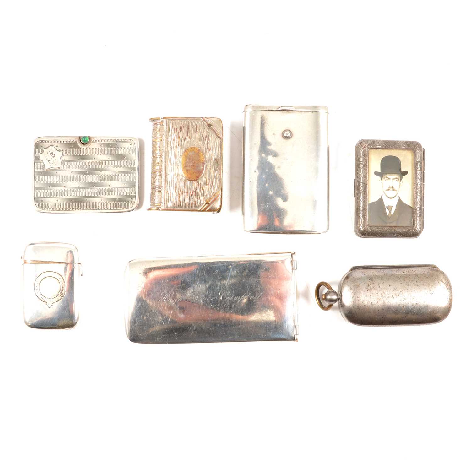 Lot 477 - Seven vesta match, sovereign and stamp cases