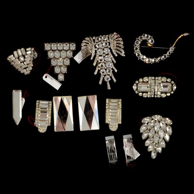 Lot 404 - Fifteen mirror glass and large paste clips and brooches.
