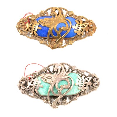 Lot 411 - Max Neiger of Gablonz - a pair of stylised fish/phoenix brooches.