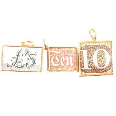 Lot 178 - Three 9 carat yellow gold emergency box charms.