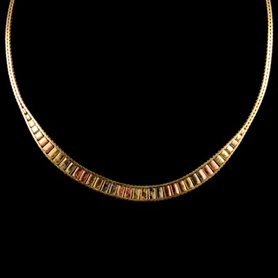 Lot 219 - A 1980's 9 carat multi-colour gold necklace.