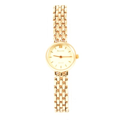 Lot 388 - Accurist Gold - a lady's 9 carat yellow gold bracelet watch.