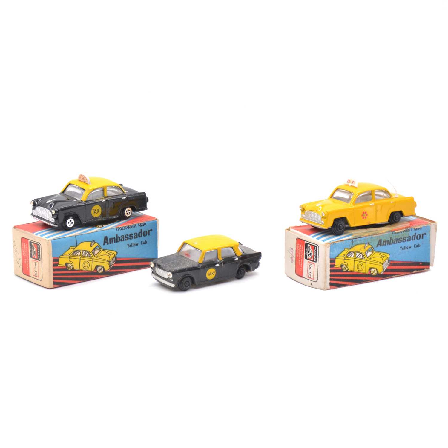 Lot 1137 - Three Maxwell Mini die-cast taxi models.