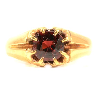 Lot 127 - A Victorian 18 carat gold garnet ring.