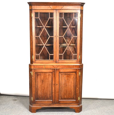 Lot 491 - George III oak and mahogany freestanding corner cabinet